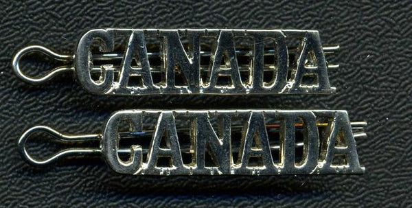 Pair of Chromed CANADA Shoulder Titles